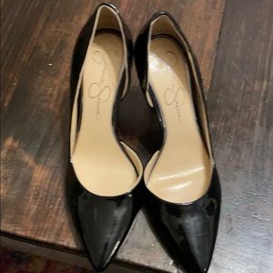 Patent leather pumps.